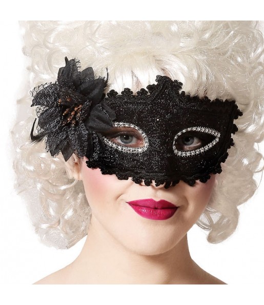Masque vénitien noir avec fleur pour compléter vos costumes