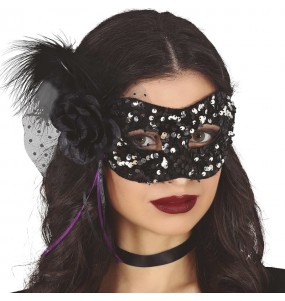 Masque à paillettes noir et argent avec fleur pour compléter vos costumes